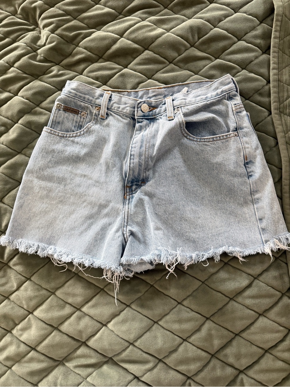 Calvin Klein Light Wash Denim Cutoff Shorts
